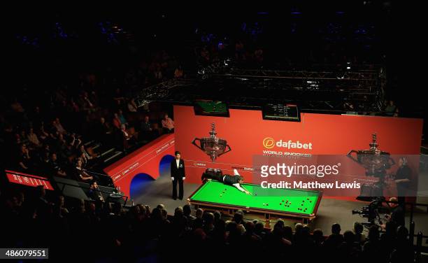 Judd Trump of England in action against Tom Ford of England during day four of the The Dafabet World Snooker Championship at Crucible Theatre on...