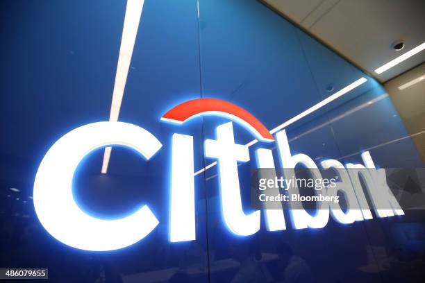 Citibank logo sits on display inside a Citibank bank branch operated by Citigroup Inc. In Moscow, Russia, on Tuesday, April 22, 2014. Bankers...