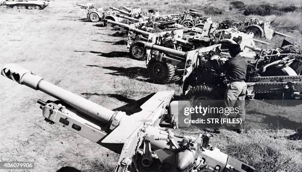 Picture released on November 14 of Israeli troops gathering seized artillery weapons in the Sinaï desert, Egypt, during the Suez crisis.
