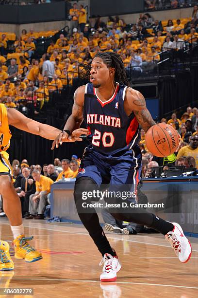 Cartier Martin of the Atlanta Hawks dribbles the ball during Game One of the Eastern Conference Quarterfinals against the Indiana Pacers during the...