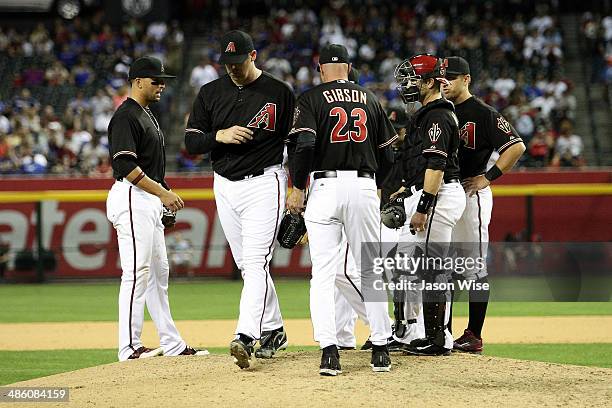 Manager Kirk Gibson of the Arizona Diamondbacks takes out pitcher J.J. Putz in the eighth inning during the game against the Los Angeles Dodgers at...
