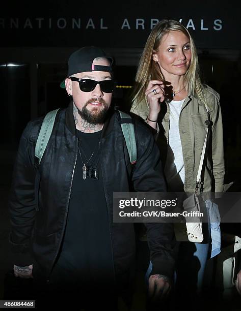 Cameron Diaz and Benji Madden are seen at LAX. On August 31, 2015 in Los Angeles, California.