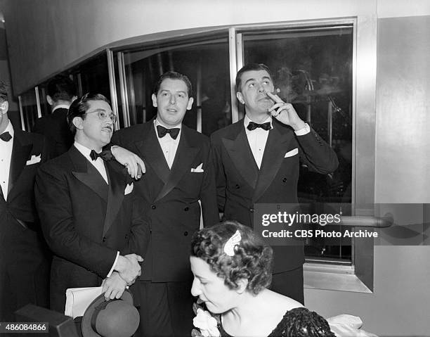 The dedication ceremony of CBS-KNX Columbia Square radio studios, Hollywood, CA. On April 30, 1938. Pictured: Mliton Berle with Ken Murray and Tony...