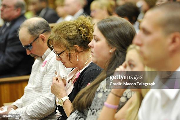 Lauren Teresa Giddings' mother Karen Giddings wipes tears away as Lauren's friend, Lori Supsic, gives her victim's statement to the court after...