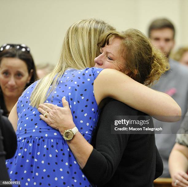 Lauren Teresa Giddings' mother, Karen Giddings, hugs Lauren's friend Lori Supsic in the courtroom after Stephen McDaniel plead guilty in court Monday...