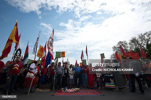 Native Americans hold a ceremony in front of the US Capitol in Washington on April 22, 2014 as the Cowboy and Indian Alliance protest the proposed...