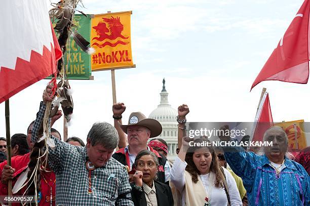 Native Americans, farmers and ranchers hold a ceremony in front of the US Capitol in Washington on April 22, 2014 as the Cowboy and Indian Alliance...