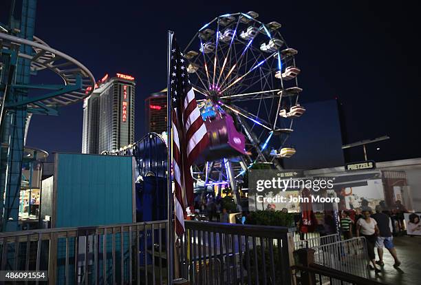 Tourists visit the Steel Pier amusement park on August 26, 2015 in Atlantic City, New Jersey. After years of economic decline in Atlantic City, in...