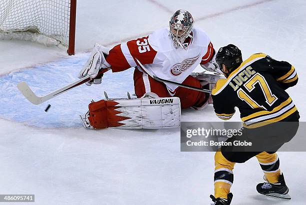 The Bruins' Milan Lucic beats Red Wings goalie Jimmy Howard late in the second period to put Boston ahead 3-1. The Boston Bruins hosted the Detroit...