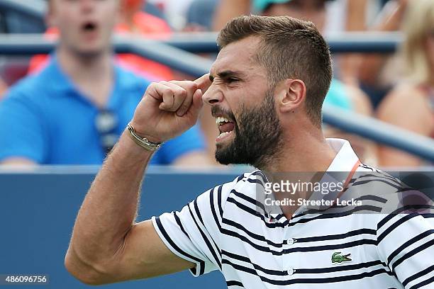 Benoit Paire of France reacts against Kei Nishikori of Japan during their Men's Single First Round match on Day One of the 2015 US Open at the USTA...