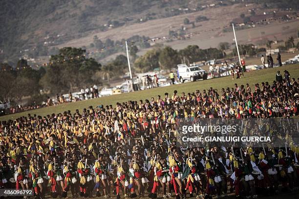 Maidens sing and dance during the last day of the annual royal Reed Dance at the Ludzidzini Royal palace on August 31, 2015 in Lobamba, Swaziland....
