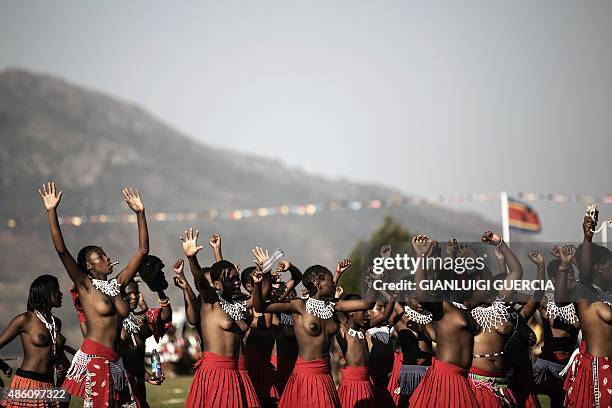 Maidens sing and dance during the last day of the annual royal Reed Dance at the Ludzidzini Royal palace on August 31, 2015 in Lobamba, Swaziland....