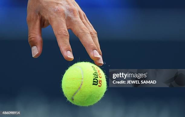 Japan's Kei Nishikori serves to France's Benoit Paire during their Mens Singles round 1 match of the US Open at USTA Billie Jean King National Tennis...