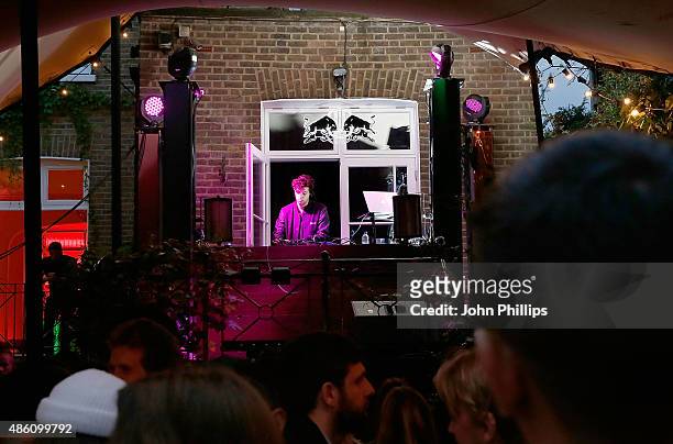 Jamie XX DJs during the Red Bull Carnival Party in Notting Hill on August 31, 2015 in London, England.