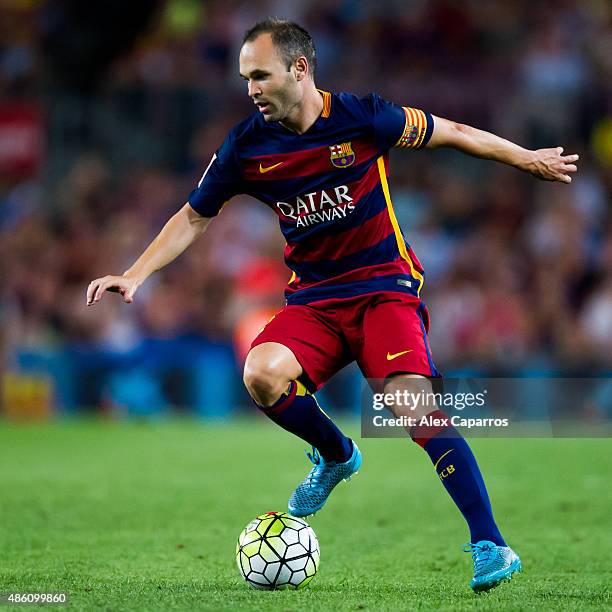 Andres Iniesta of FC Barcelona controls the ball during the La Liga match between FC Barcelona and Malaga CF at Camp Nou on August 29, 2015 in...