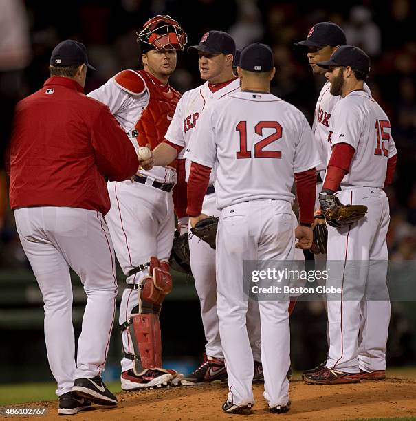 Boston Red Sox manager John Farrell takes out starting pitcher Jake Peavy during sixth inning action at Fenway Park on Sunday, April 20, 2014.