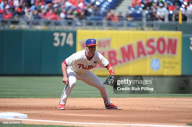 Jayson Nix of the Philadelphia Phillies fields during the game against the Atlanta Braves on April 17, 2014 at Citizens Bank Park in Philadelphia,...