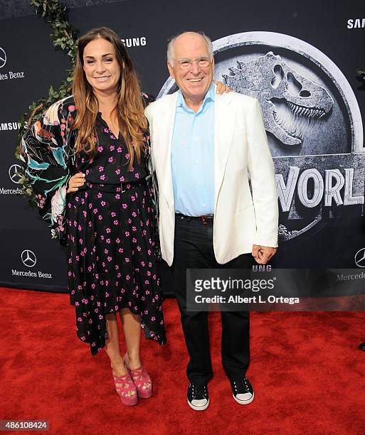 Singer Jimmy Buffet and wife Savannah Buffet arrive for the Premiere Of Universal Pictures' "Jurassic World" held in the courtyard of Hollywood &...