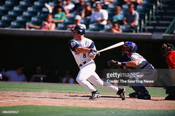 Todd Greene of the Anaheim Angels bats against the Toronto Blue Jays at Angel Stadium of Anaheim on August 25, 1999 in Anaheim, California.