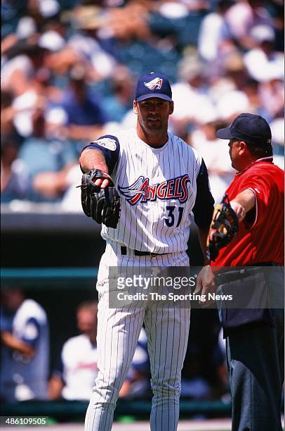 Chuck Finley of the Anaheim Angels pitches against the Toronto Blue Jays at Angel Stadium of Anaheim on August 25, 1999 in Anaheim, California.