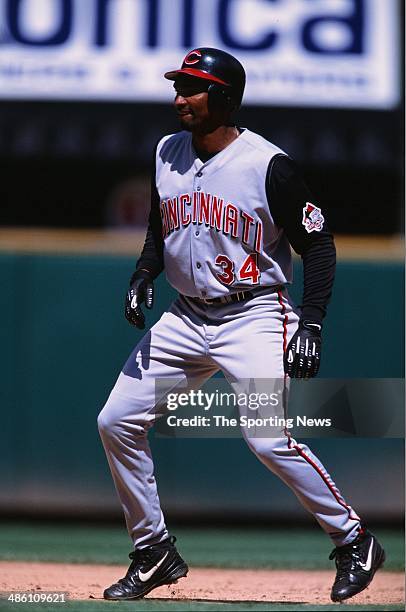 Juan Encarnacion of the Cincinnati Reds runs against the St. Louis Cardinals at Busch Stadium on May 19, 2002 in St. Louis, Missouri. The Cardinals...