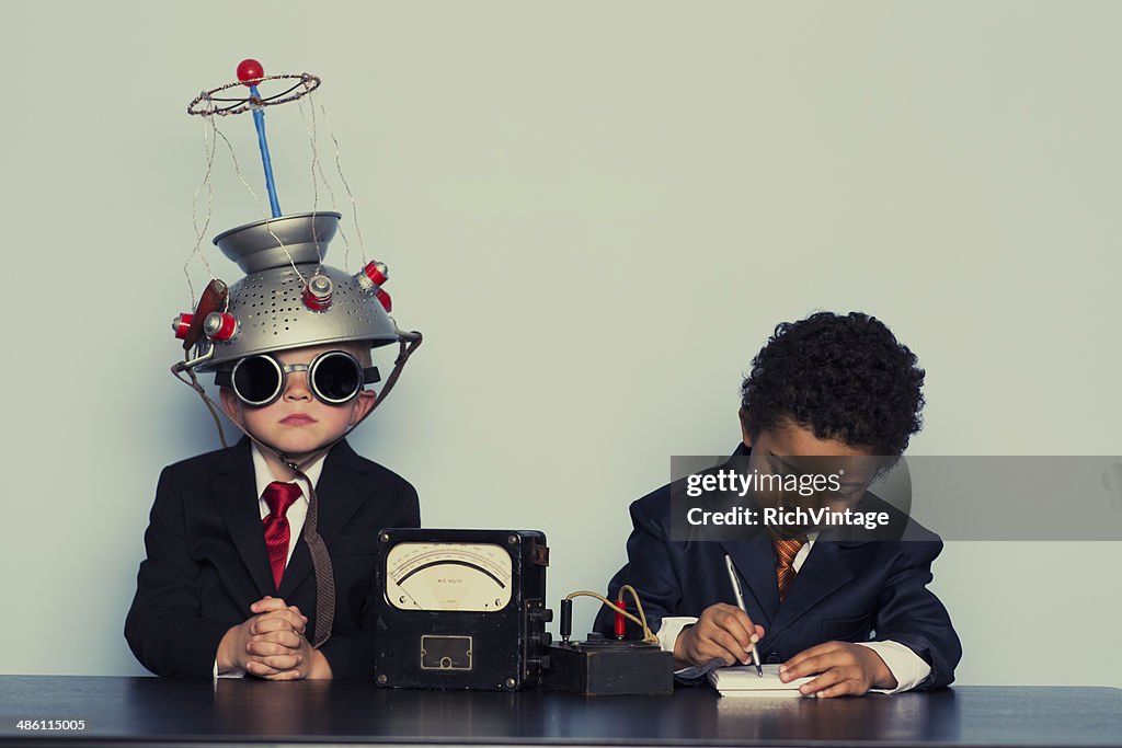 Two Business Boys Maximize Ideas with Mind Helmet