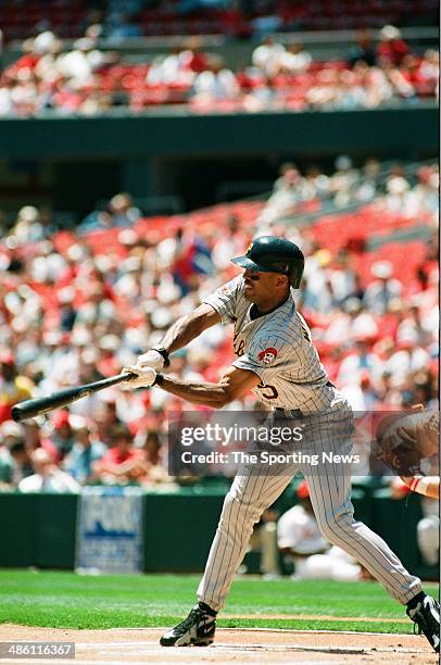 Tony Womack of the Pittsburgh Pirates bats against the St. Louis Cardinals at Busch Stadium on May 21, 1997 in St. Louis, Missouri. The Pirates...
