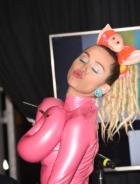 Host Miley Cyrus, styled by Simone Harouche, poses in the press room at the 2015 MTV Video Music Awards at Microsoft Theater on August 30, 2015 in...