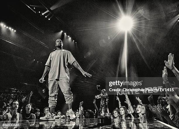 Recording artist Kanye West accepts the Vanguard Award onstage during the 2015 MTV Video Music Awards at Microsoft Theater on August 30, 2015 in Los...