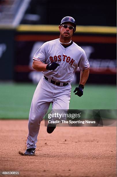 Carlos Baerga of the Boston Red Sox runs against the Detroit Tigers at Comerica Park on June 6, 2002 in Detroit, Michigan. The Red Sox defeated the...