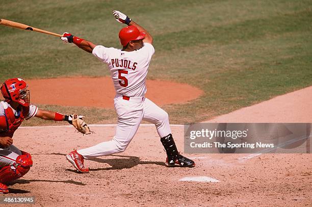 Albert Pujols of the St. Louis Cardinals bats against the Philadelphia Phillies at Busch Stadium on August 19, 2001 in St. Louis, Missouri. The...