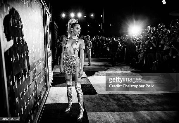 Host Miley Cyrus, styled by Simone Harouche, attends the 2015 MTV Video Music Awards at Microsoft Theater on August 30, 2015 in Los Angeles,...