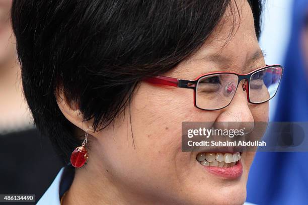 Worker's Party chairman and opposition candidate for the Aljunied Group Representation Constituency , Sylvia Lim Swee Lian arrives at the nomination...