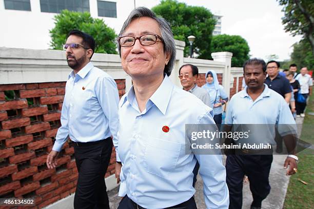Worker's Party candidate, Chen Show Mao for the Aljunied Group Representation Constituency arrives at the nomination centre at Raffles Institution on...