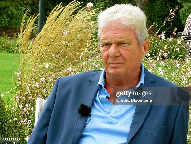 Dietmar Hopp, German billionaire and co-founder of SAP SE, pauses during a Bloomberg Television interview in St. Leon-Rot, Germany, on Monday, Aug....