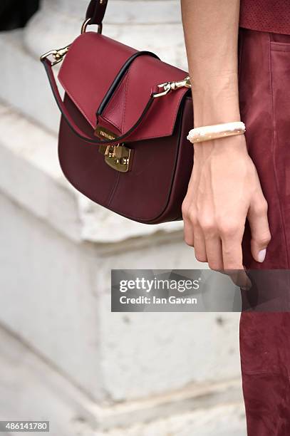 Festival hostess Elisa Sednaoui, handbag detail, arrives to a photocall during the 72nd Venice Film Festival on September 1, 2015 in Venice, Italy.