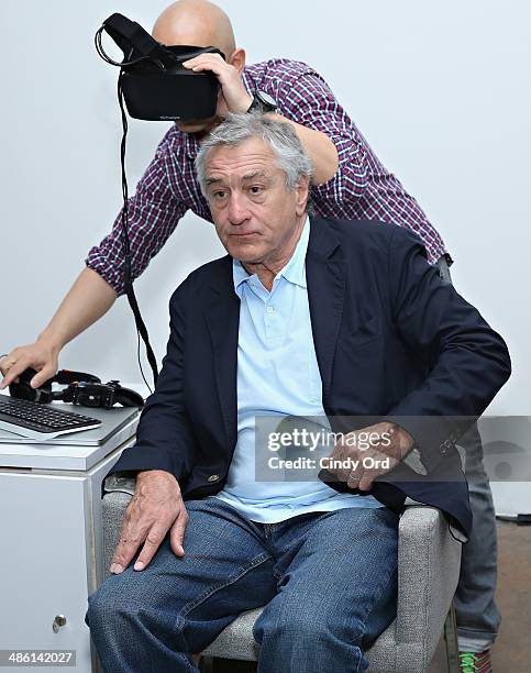 Tribeca Film Festival co-founder Robert De Niro uses virtual reality goggles as part of 'The Oculus Rift Experience' at the Storyscapes Press Preview...