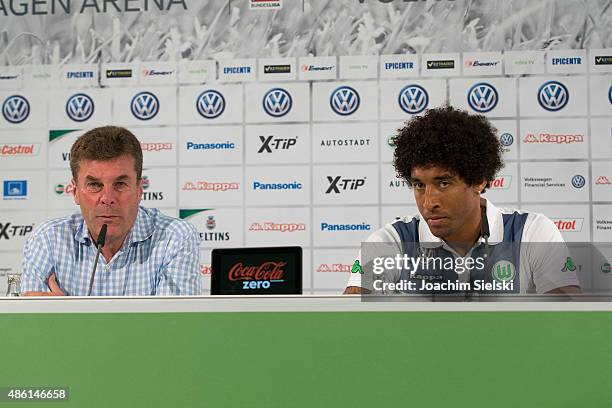 Head Coach Dieter Hecking and Dante talks to the media during a Press conference at Volkswagen Arena on September 1, 2015 in Wolfsburg, Germany.