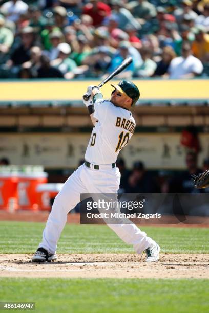 Daric Barton of the Oakland Athletics bats during the game against the Seattle Mariners at O.co Coliseum on April 6, 2014 in Oakland, California. The...