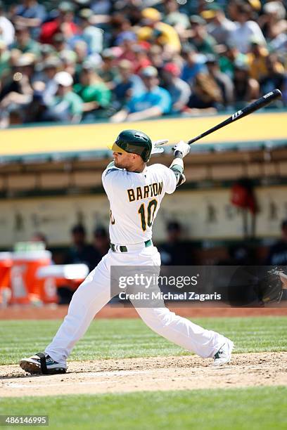 Daric Barton of the Oakland Athletics bats during the game against the Seattle Mariners at O.co Coliseum on April 6, 2014 in Oakland, California. The...