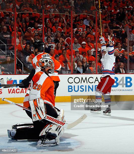 Martin St. Louis of the New York Rangers celebrates his goal at 10:24 of the first period against Ray Emery of the Philadelphia Flyers in Game Three...