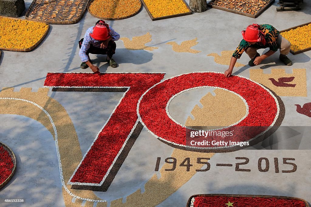 Villagers Dry Crops Into Pattern Of 70 Anniversary Of Victories Of WWII In Shangrao