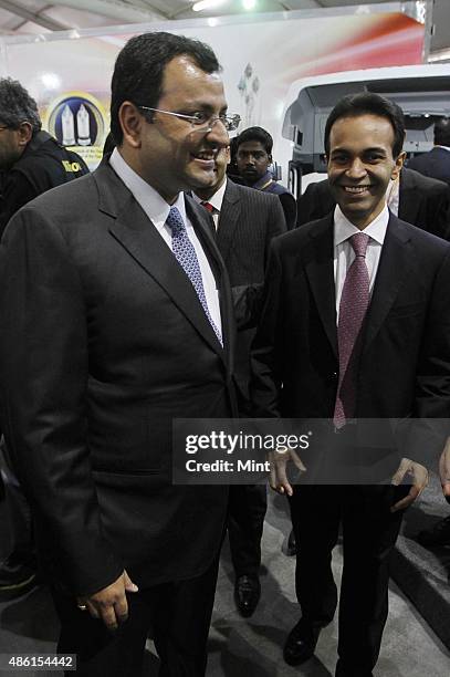 Tata Group Chairman Cyrus Mistry along with Ashok Leyland Chairman Dheeraj Hinduja at Ashok Leyland Hall at the Auto Expo 2014 on February 5, 2014 in...