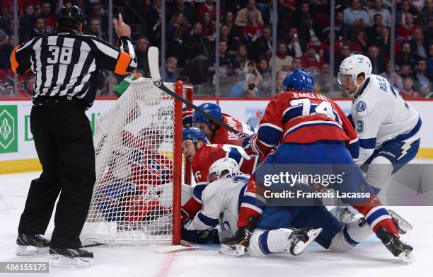 Ondrej Palat of the Tampa Bay Lightning scores a goal on goaltender Carey Price of the Montreal Canadiens defended by Josh Gorges, David Desharnais...