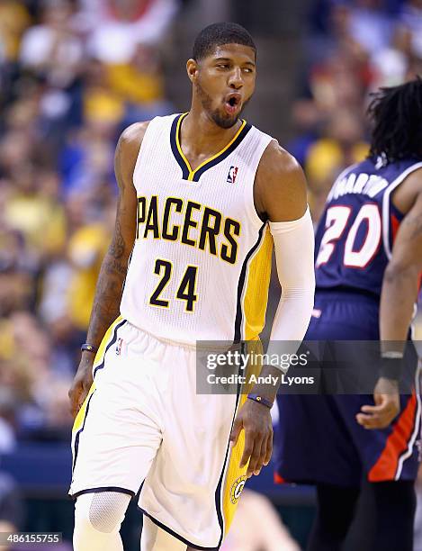 Paul George of the Indiana Pacers celebrates in the 101-85 win over the Atlanta Hawks in Game 2 of the Eastern Conference Quarterfinals during the...