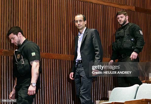Brazil's construction giant Odebrecht president Marcelo Odebrecht arrives for a hearing of the parliamentary committee of the Petrobras investigation...