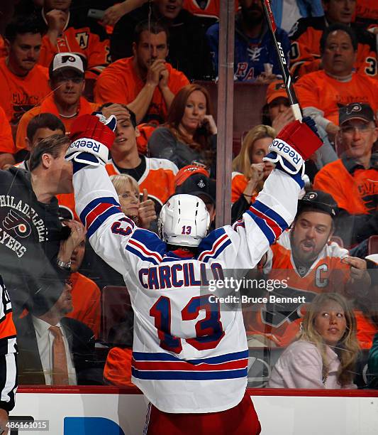 Daniel Carcillo of the New York Rangers celebrates his third period goal against the Philadelphia Flyers in Game Three of the First Round of the 2014...