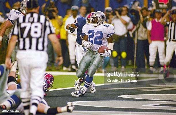 Super Bowl XXVIII: Dallas Cowboys Emmitt Smith victorious in endzone after scoring touchdown vs Buffalo Bills at Georgia Dome. Atlanta, GA 1/30/1994...