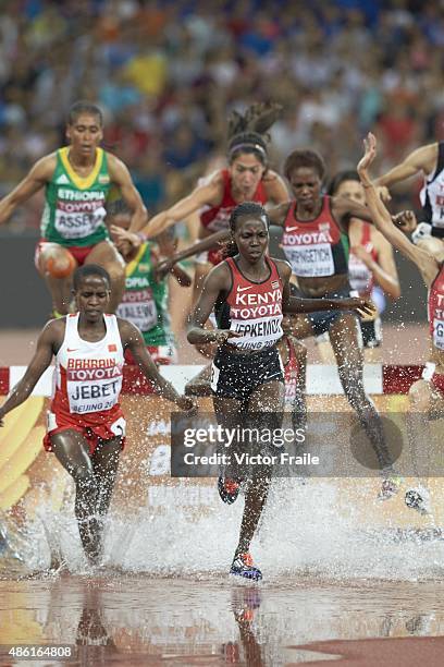 15th IAAF World Championships: Kenya Hyvin Kiyeng Jepkemoi and Bahrain Ruth Jebet in action during Women's 3,000M Steeplechase at National Stadium....