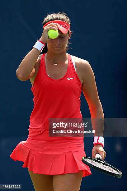 Laura Robson of Great Britain reacts against Elena Vesnina of Russia during their Women's Singles First Round match on Day Two of the 2015 US Open at...
